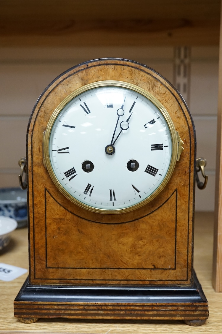 A French late 19th century domed topped burr walnut mantel clock, 23cm high
